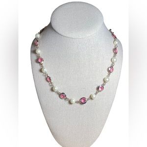 Faux pearl with faux pink crystals